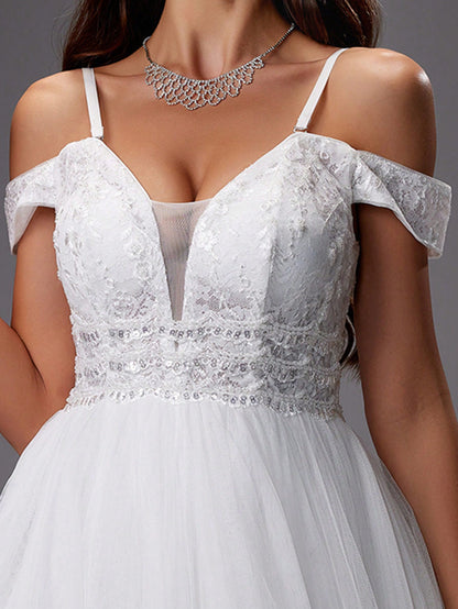 Zoom sur robe de mariée princesse dentelle paillette